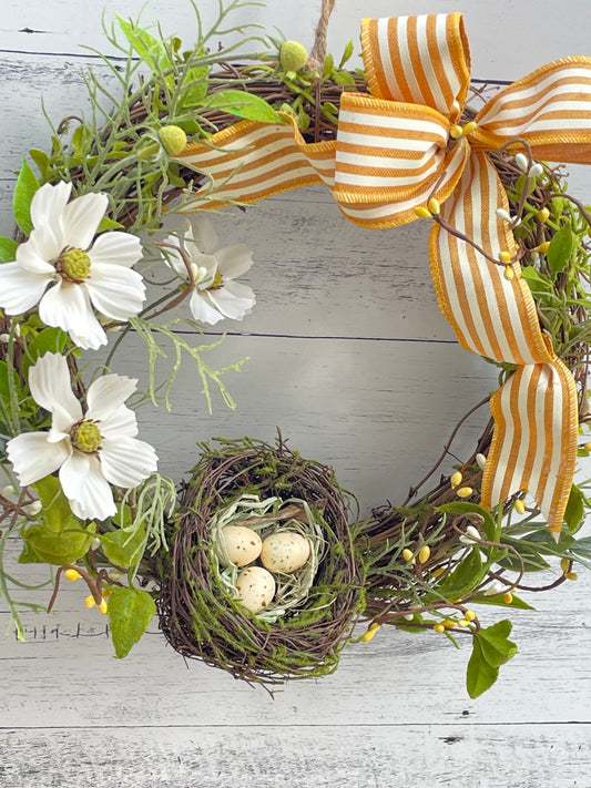 Spring wreath with bird's nest